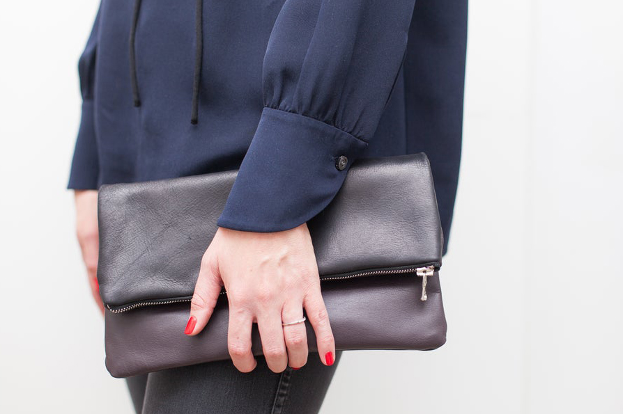 Leather fold over outlet clutch bag